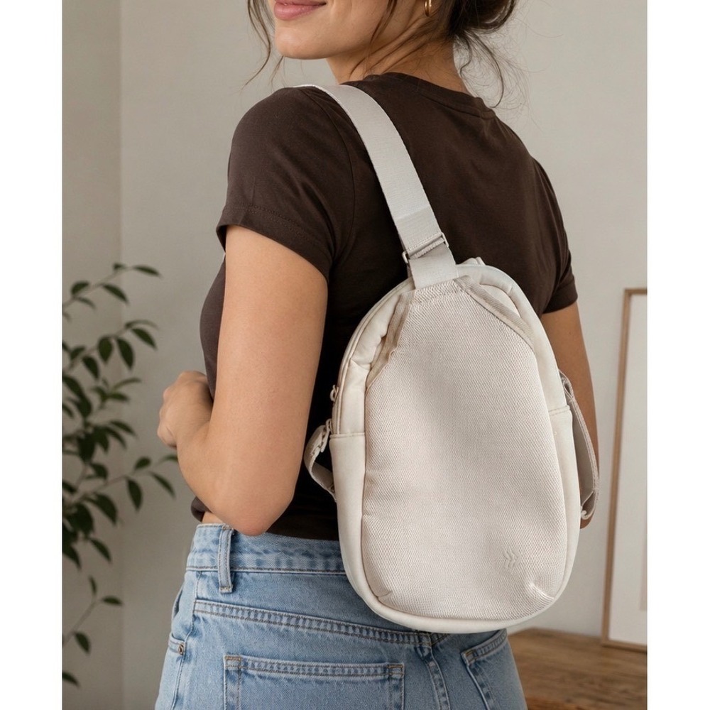 All In Motion Sling Crossbody Bag Cream Hidden Pocket Purse Sporty